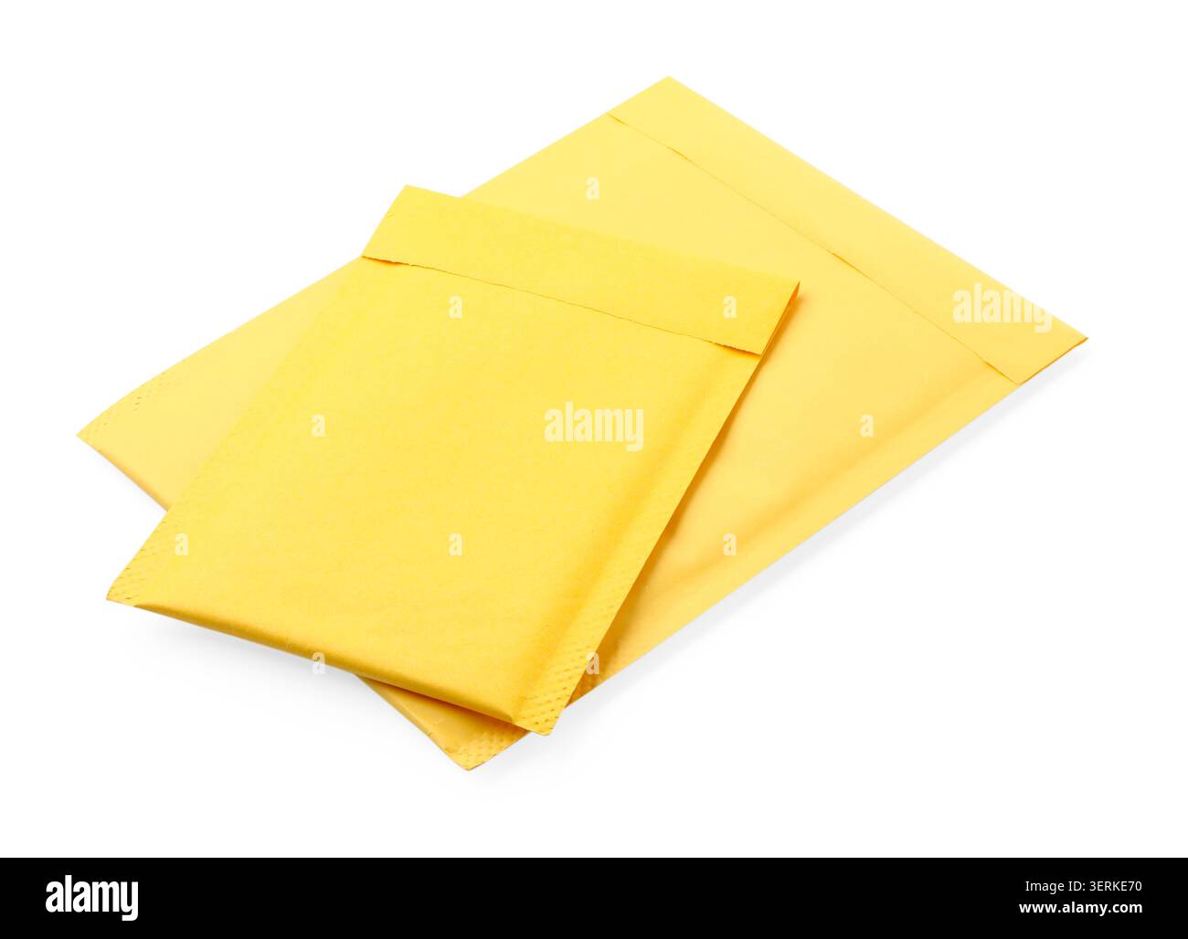 Two yellow paper envelopes isolated on white Stock Photo