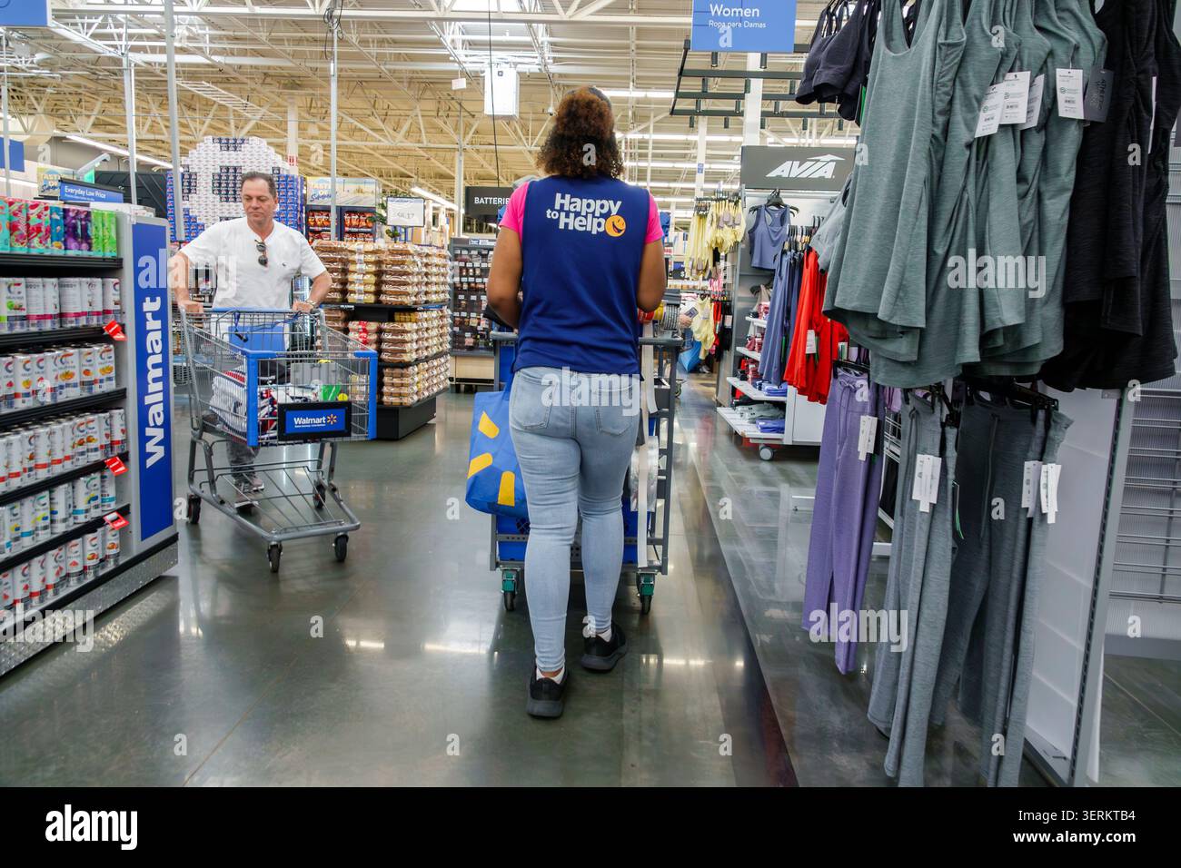 Miami Florida, Walmart Supercenter, discount department store shopping, inside interior, Walmart employee, Walmart associate, Happy to Help, customer Stock Photo