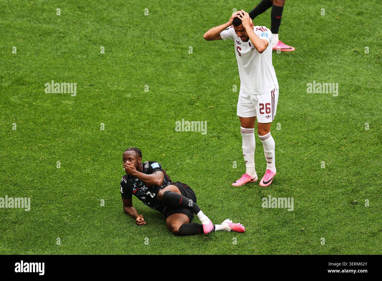 Qatar s Mohamed Manai 26 Reacts After Canada s Ismael Kone 8 Was qatar-s-mohamed-manai-26-reacts-after-canada-s-ismael-kone-8-was