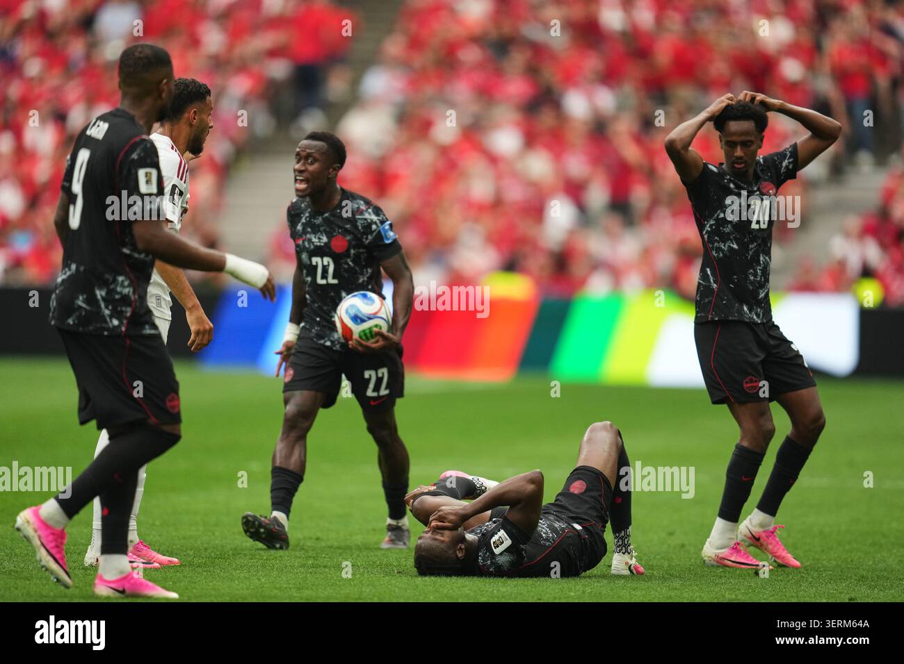 Canada s Ismael Kone Below Lays On The Ground After Sustaining An canada-s-ismael-kone-below-lays-on-the-ground-after-sustaining-an