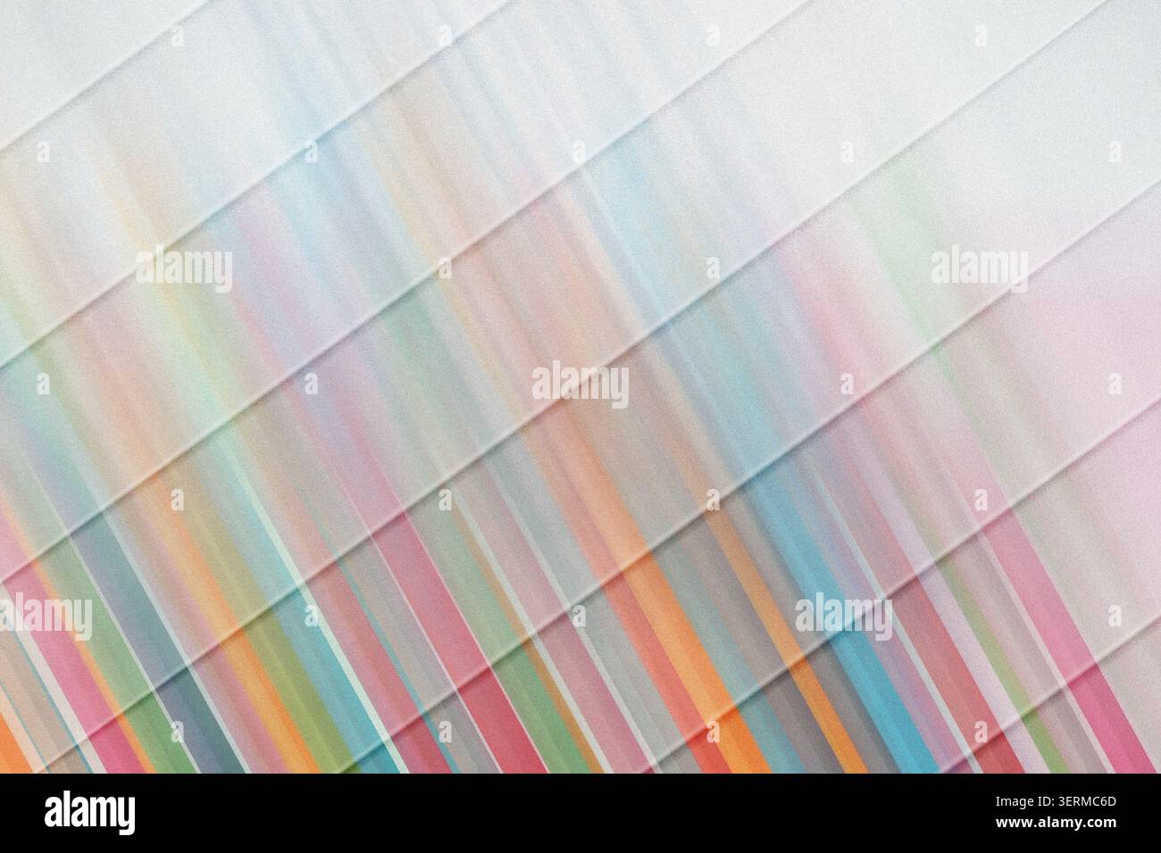 An abstract background featuring diagonal stripes with a vibrant, multi-colored gradient effect, creating a dynamic and energetic visual. Stock Photo