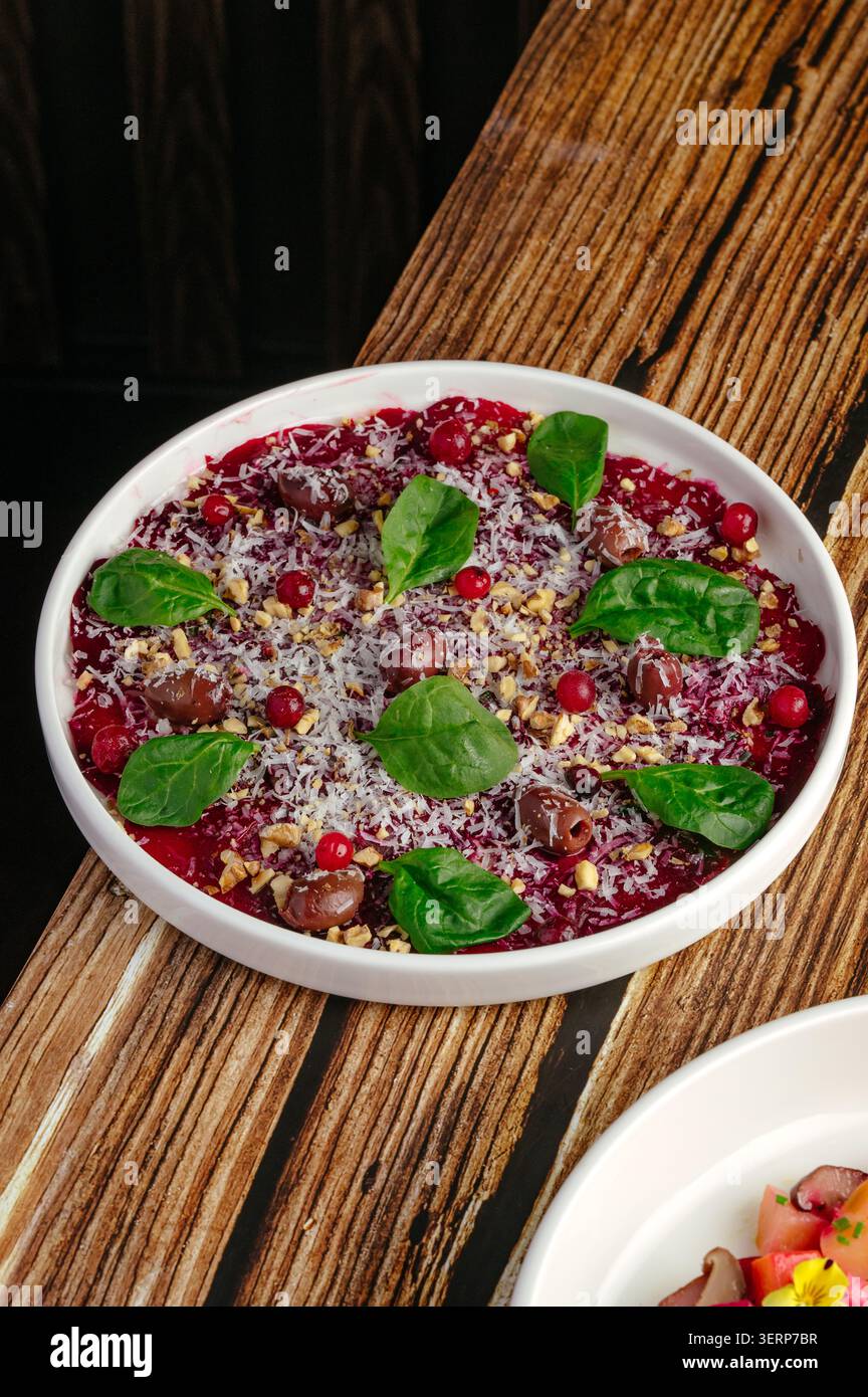 Gourmet beetroot salad on a rustic table Stock Photo