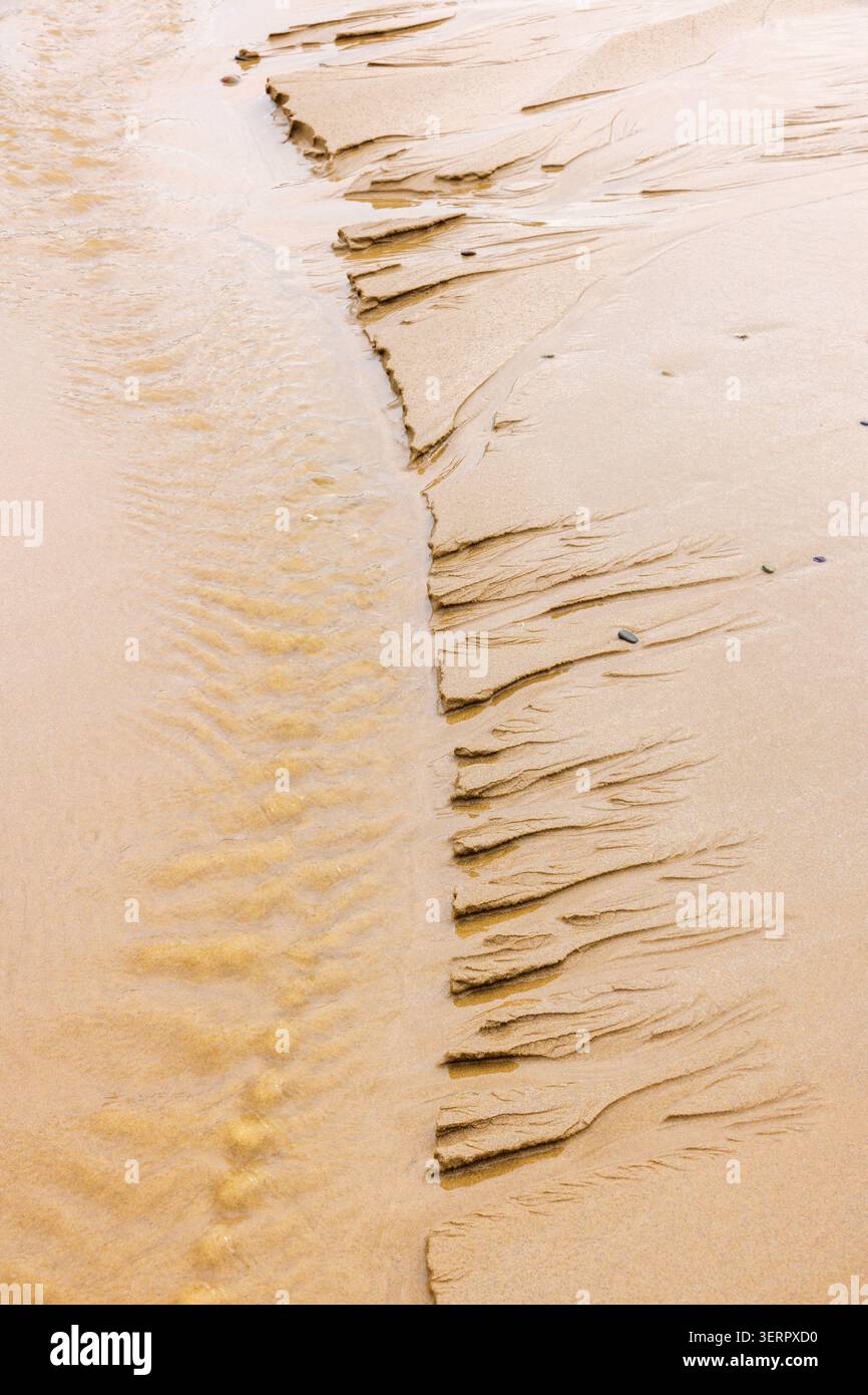 Pattern in the sand on a beach in low tide Stock Photo