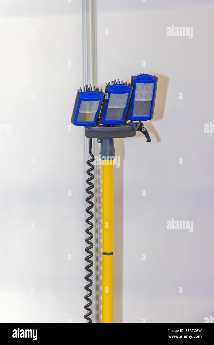 Portable Led Work Light Reflectors at Pole at Construction Site Stock Photo