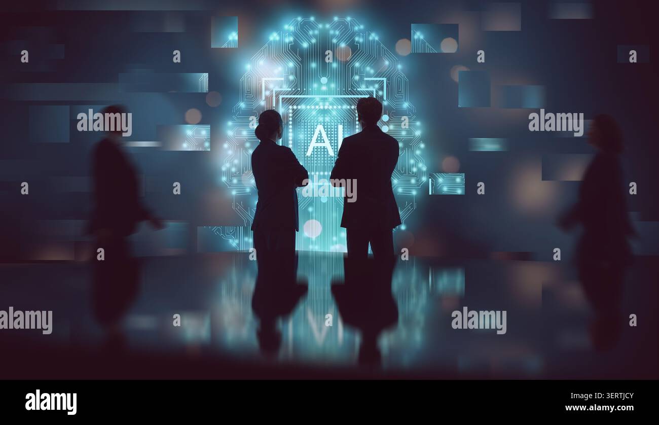 Silhouetted business professionals standing in front of a glowing digital brain and AI interface symbolize the collaboration and forward-thinking mind Stock Photo