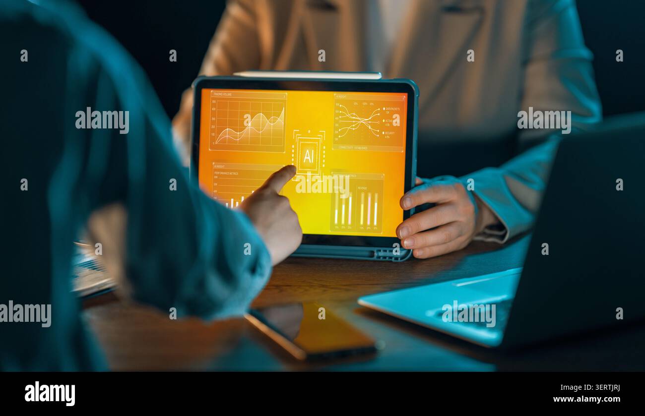 Dynamic business scene featuring professionals collaborating with advanced artificial intelligence analytics on a tablet. Vibrant digital dashboard di Stock Photo
