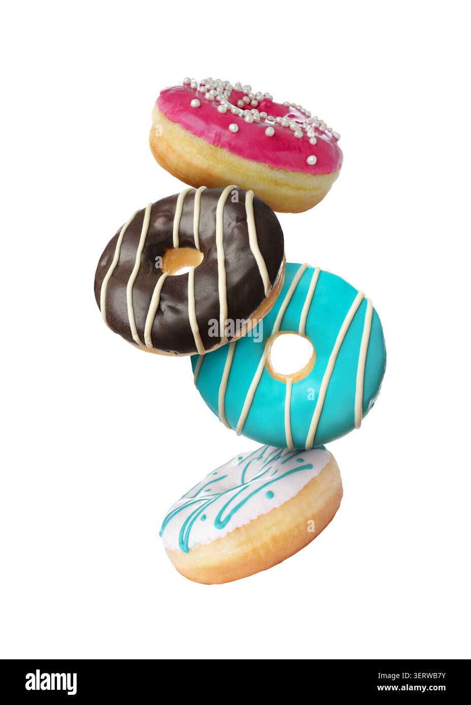 Sweet donuts covered with icing falling on white background Stock Photo