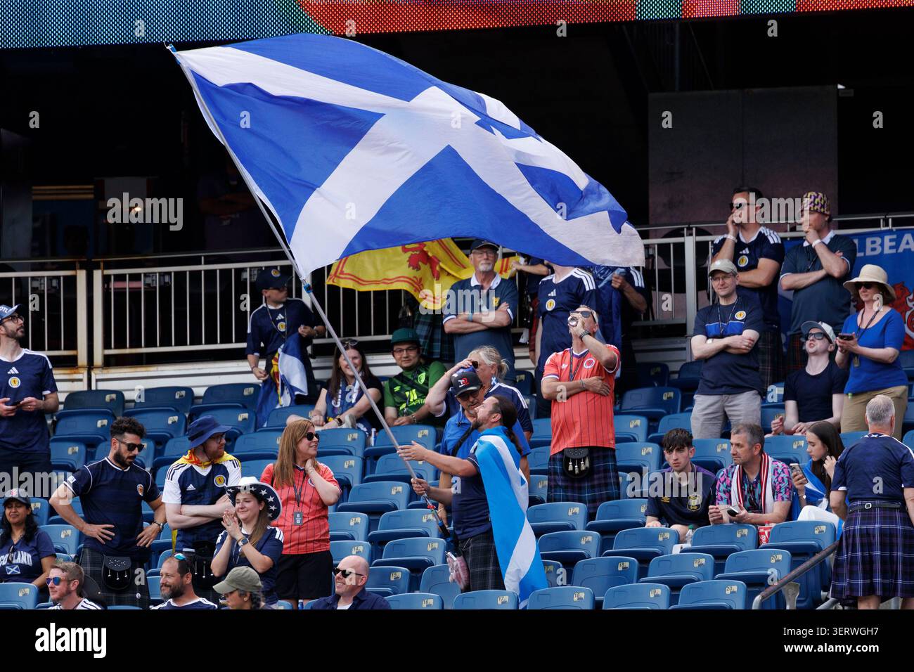 members-of-the-tartan-army-fly-a-large-flag-before-the-start-of-the