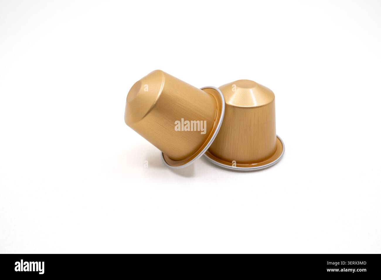 Espresso Capsules in White Background. Stock Photo