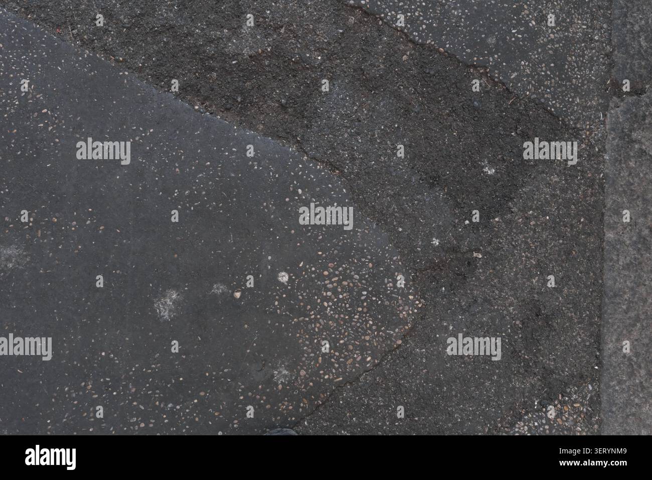 ABSTRACT BACKGROUND TEXTURE OLD CRACKED ASPHALT PAVEMENT Stock Photo