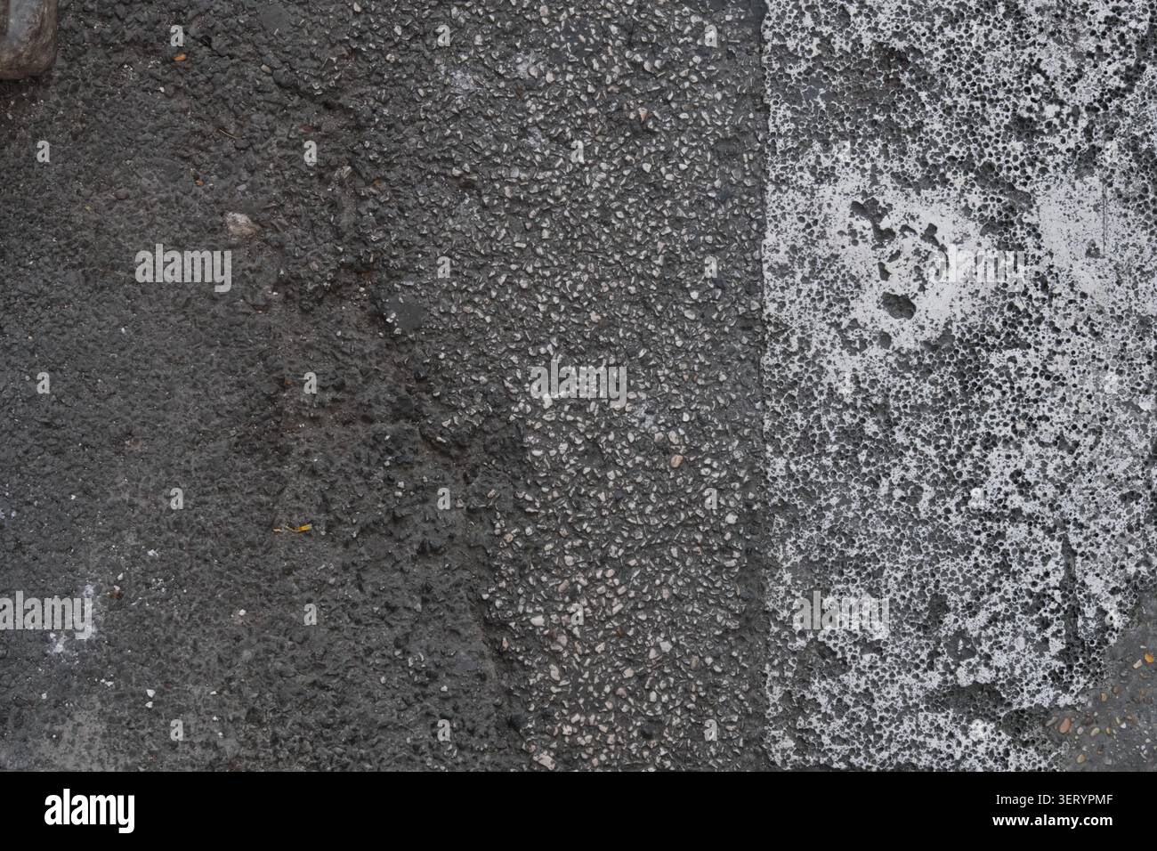 ABSTRACT BACKGROUND TEXTURE OLD CRACKED ASPHALT PAVEMENT Stock Photo