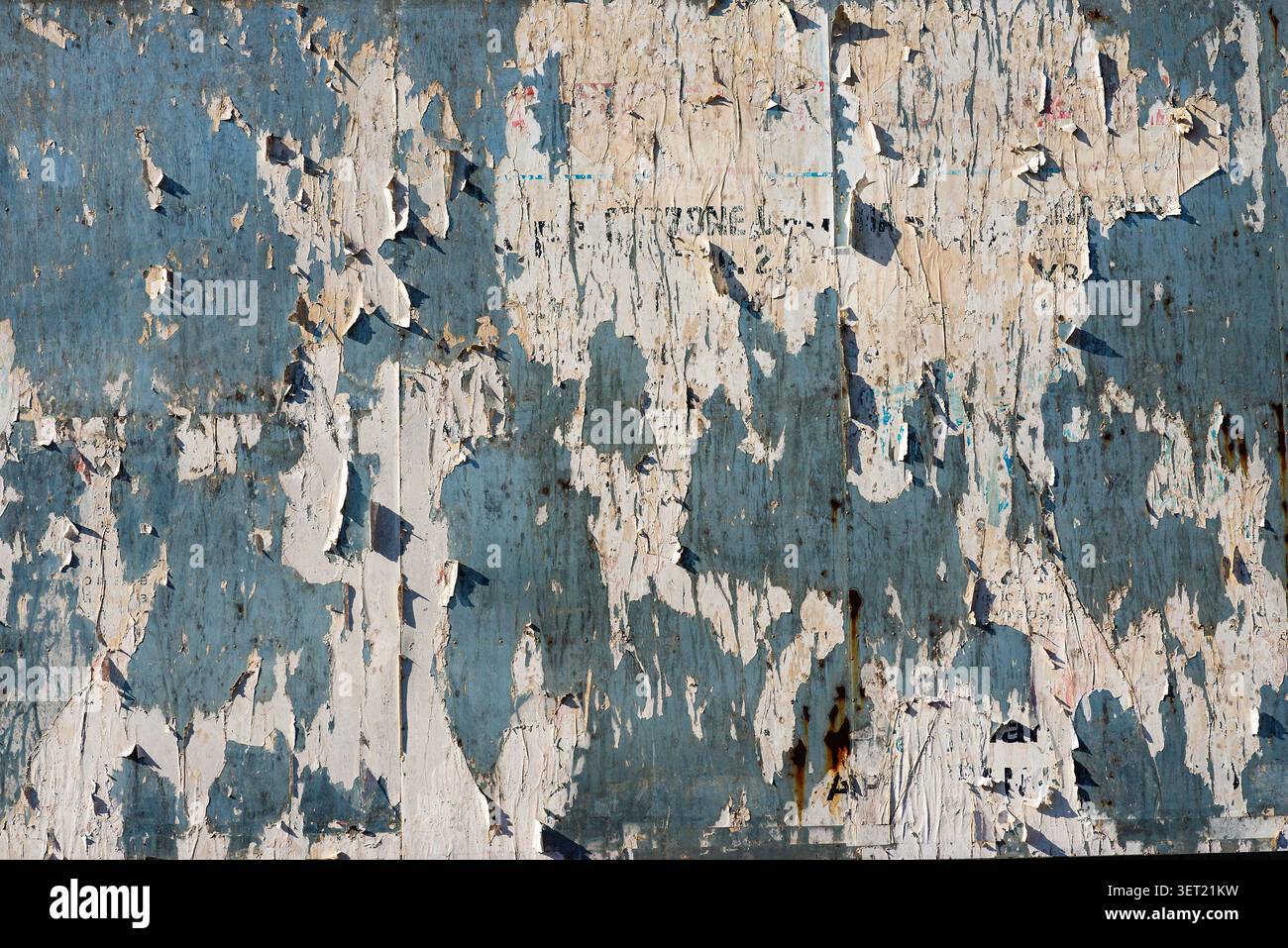 Distressed blue and beige peeling paint background Stock Photo