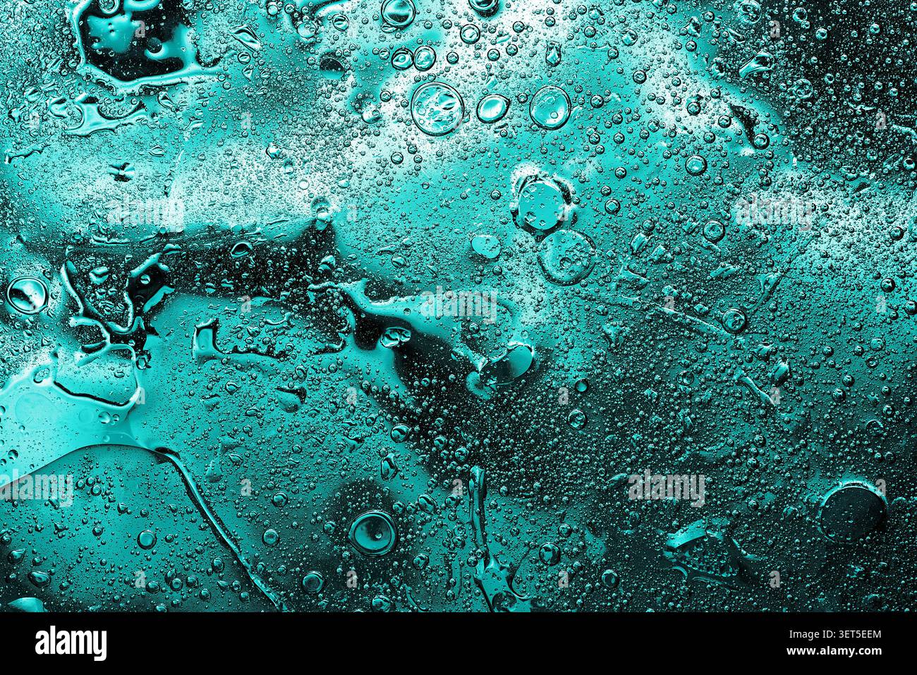 Dark turquoise fluid texture with organic bubbles and lines Stock Photo