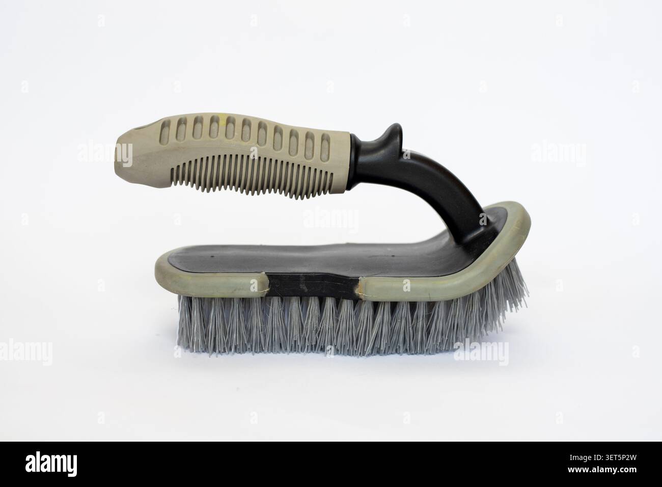 Scrubbing Brush with Handle Isolated on White Background. Stock Photo