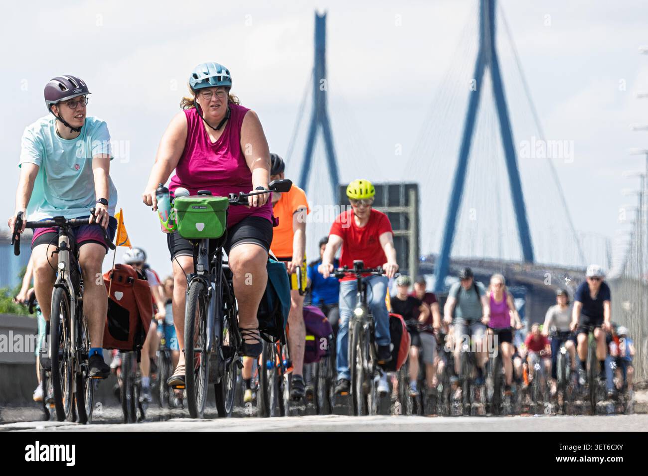 21 June 2026, Hamburg: Participants in the ADFC bike rally ride across ...
