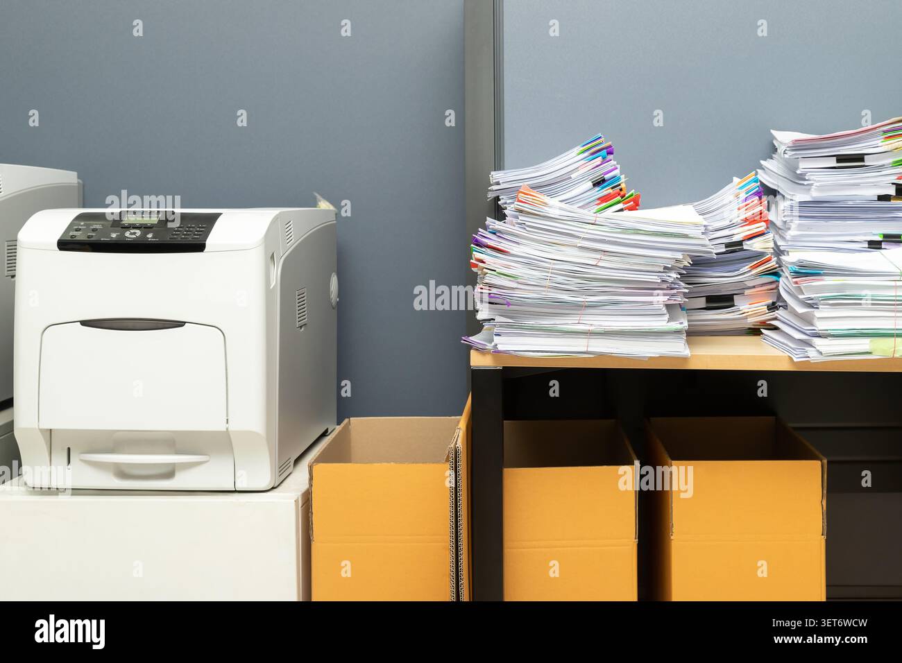 Business documents stack on table. report papers stack and printer in office. Stock Photo