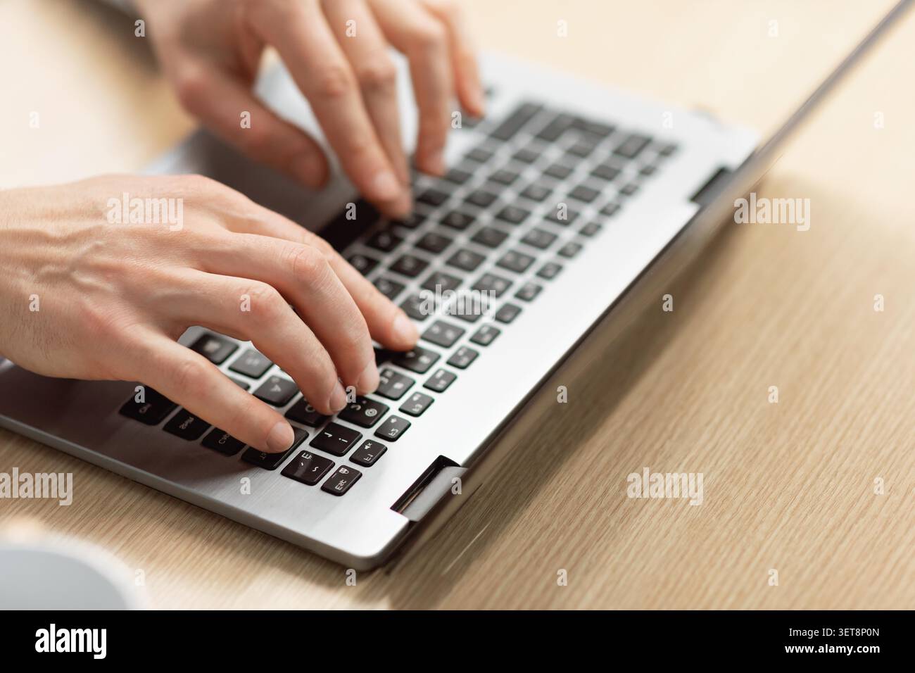 Unrecognizable Hands Typing On Laptop Keyboard In Office Setting, Remote Work Concept Stock Photo