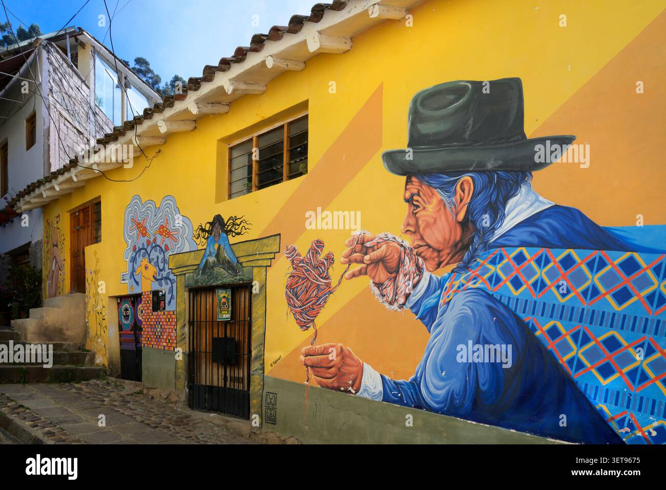 Wall art on buildings in Cusco, Peru Stock Photo