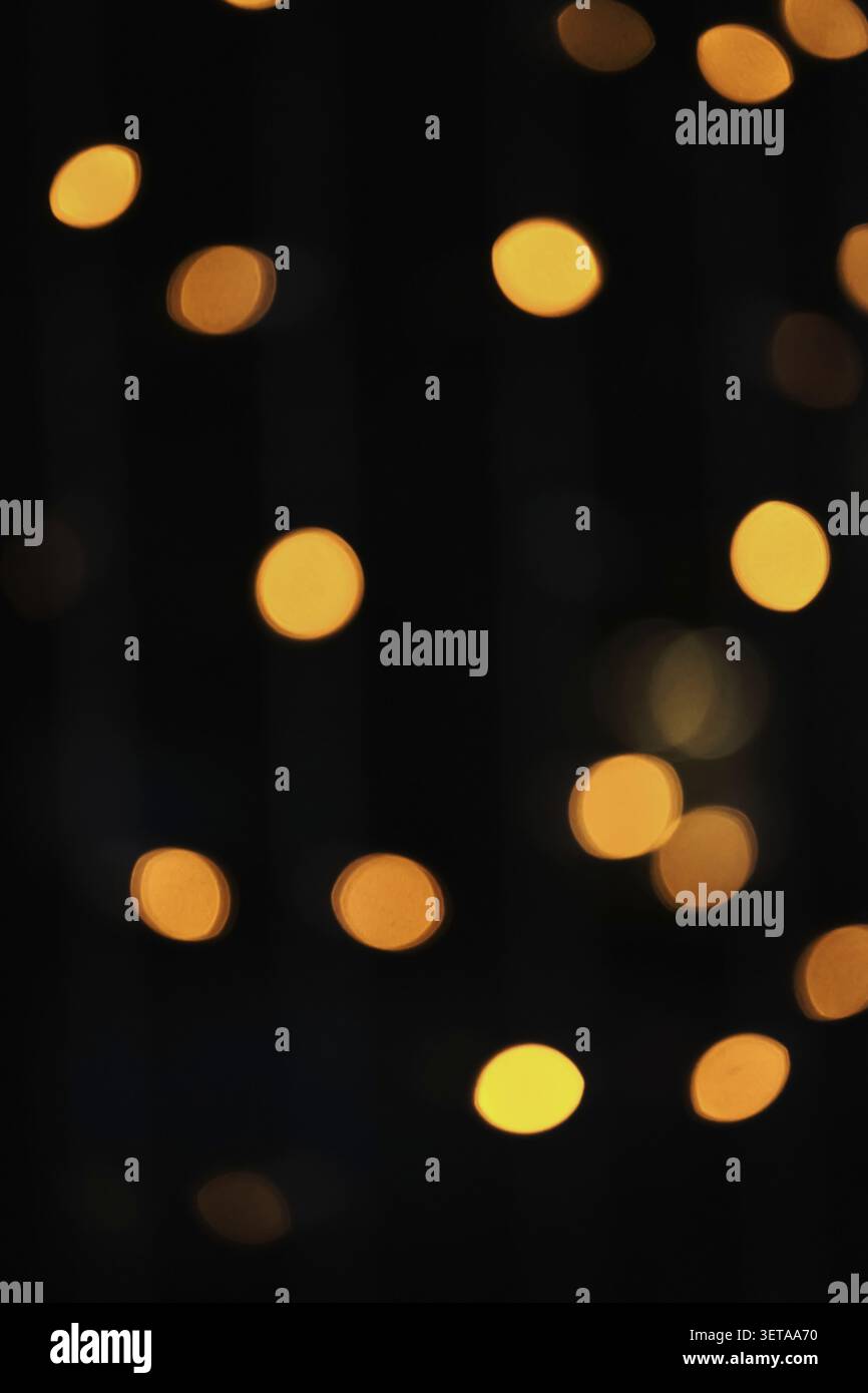 Abstract bokeh lights on dark background Stock Photo