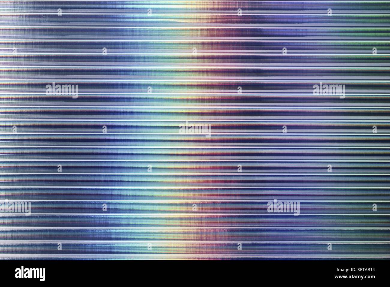 Iridescent ribbed glass background with color gradient, horizontal abstract texture Stock Photo