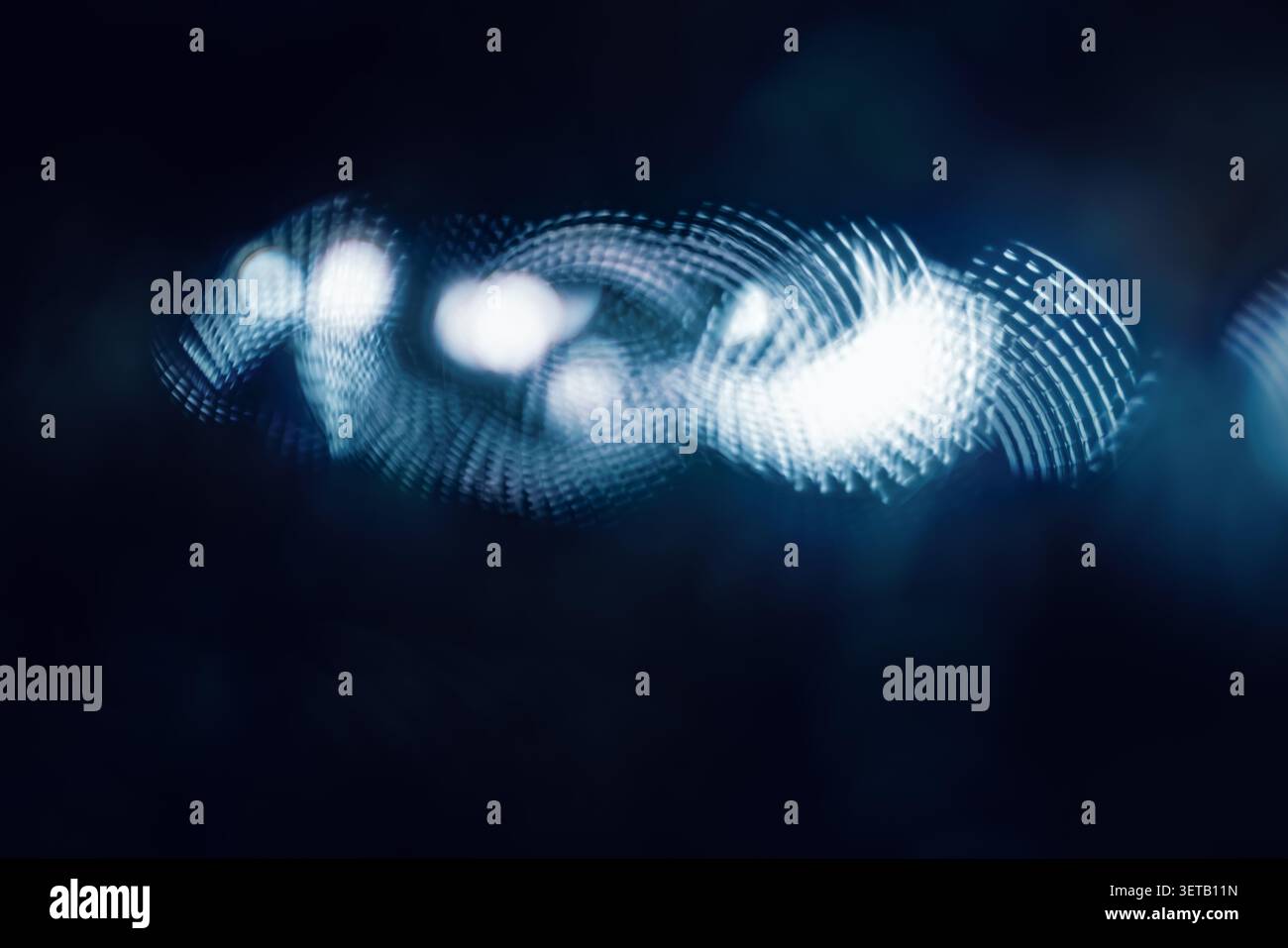 Abstract Light Patterns in Dark Background Featuring Bokeh and Motion Blur Stock Photo