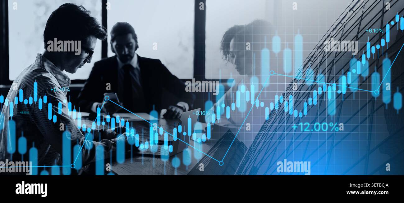 Multiracial group of managers sitting at desk at modern office Stock Photo