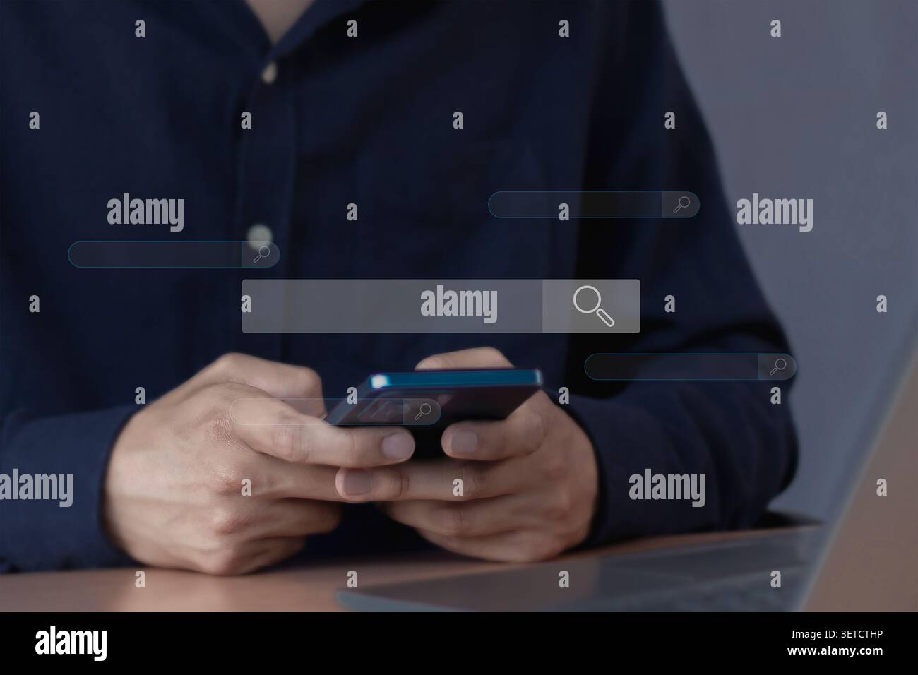 Technology Search Engine Optimization. man's hands are using a computer notebook to Searching for information. Stock Photo