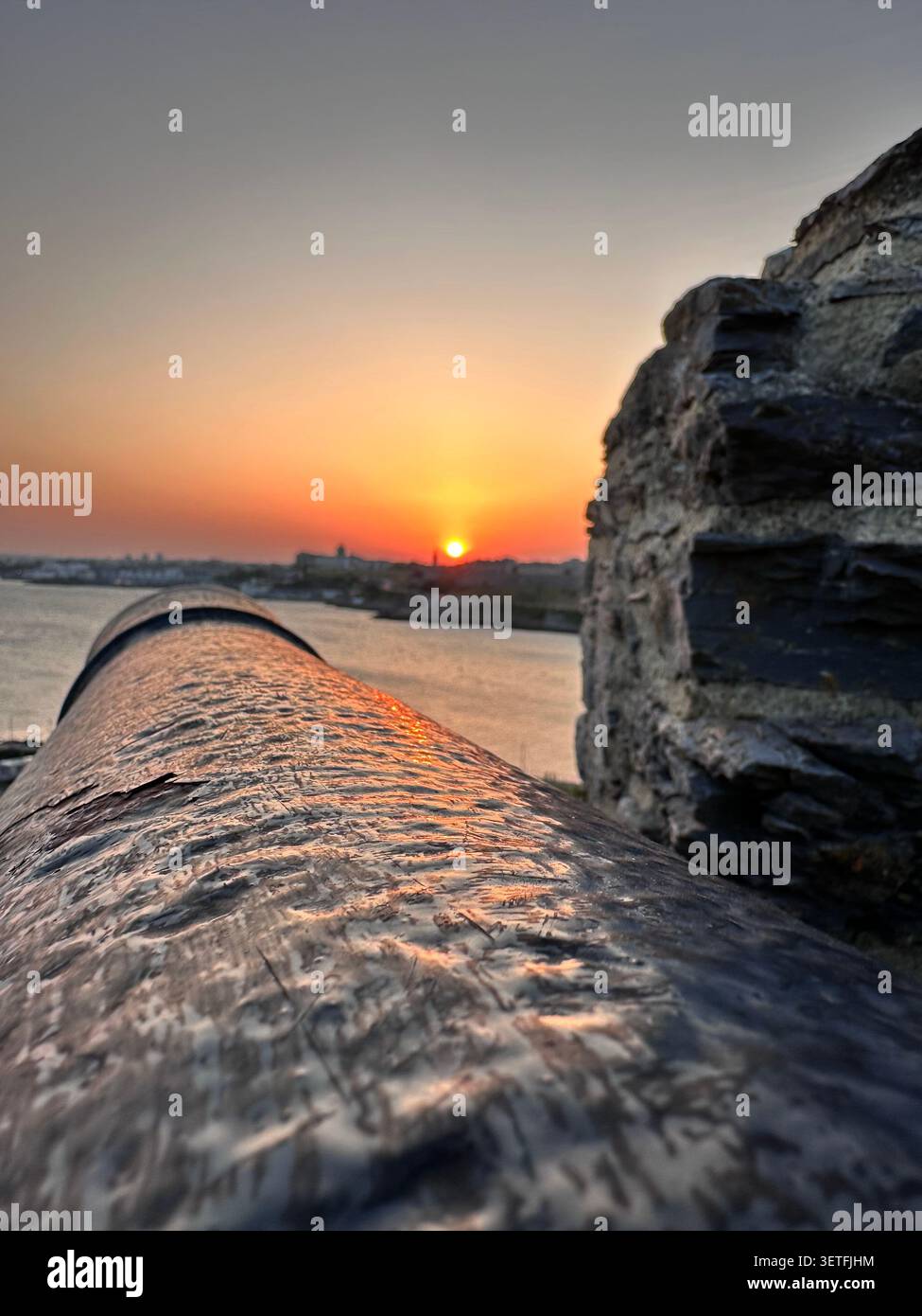 Sunset on the Summer Solstice over Plymouth Sound, England, with a view over Plymouth Hoe. Taken from Mountbatten Castle. - Smartphone Captured Stock Image