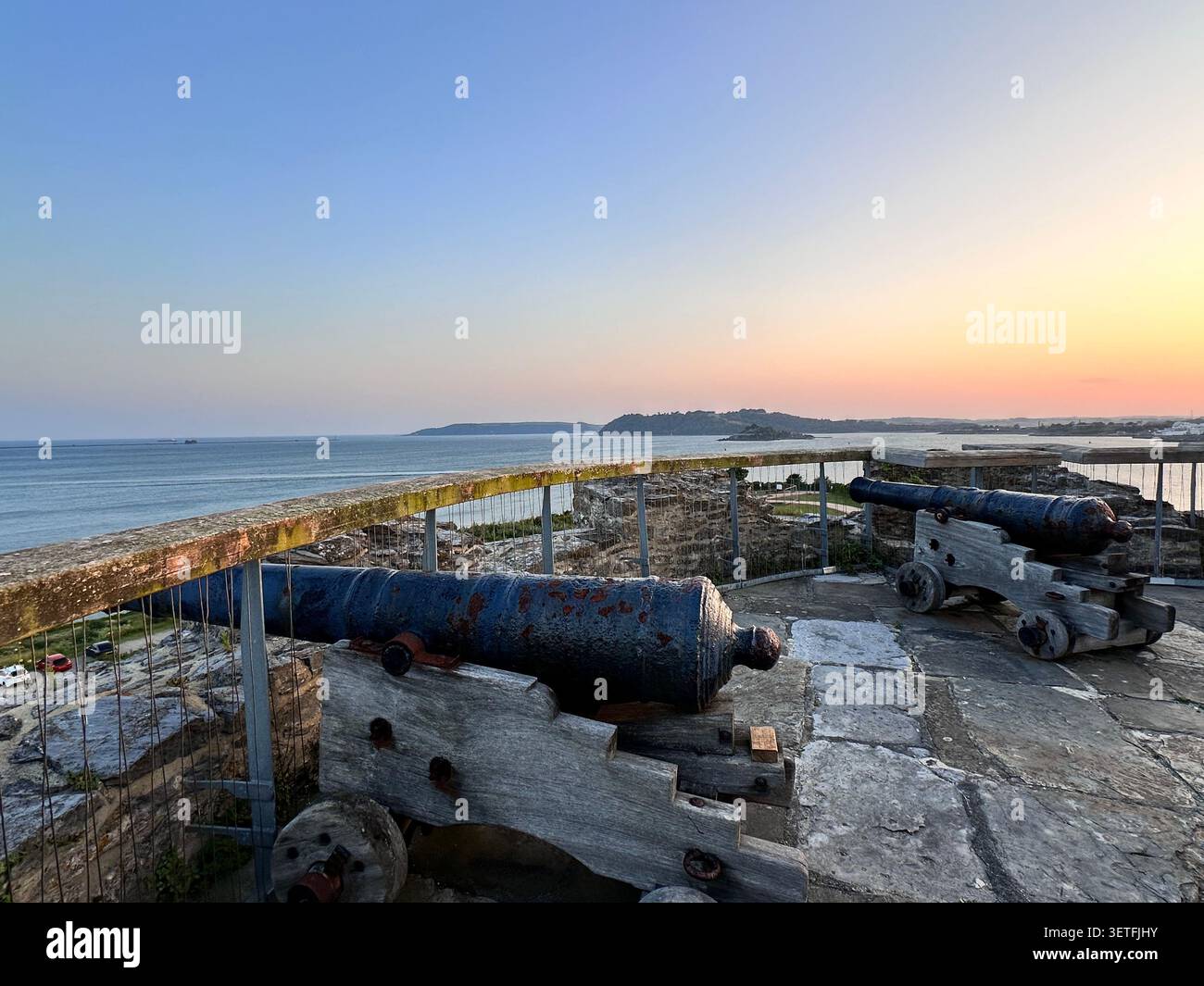 Sunset on the Summer Solstice over Plymouth Sound, England, with a view over Plymouth Hoe. Taken from Mountbatten Castle. - Smartphone Captured Stock Image