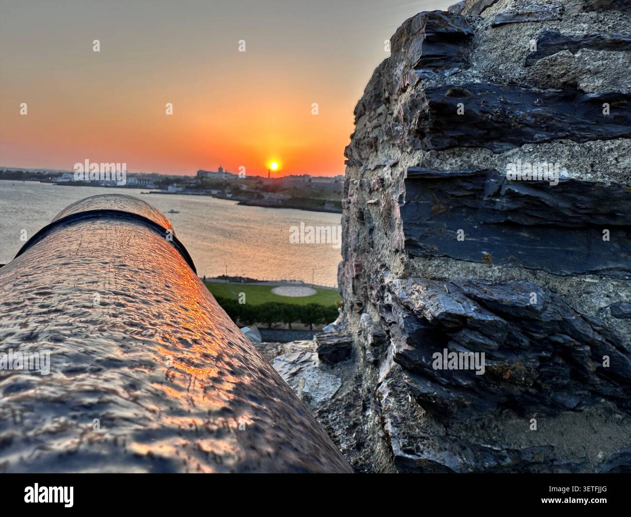 Sunset on the Summer Solstice over Plymouth Sound, England, with a view over Plymouth Hoe. Taken from Mountbatten Castle. - Smartphone Captured Stock Image