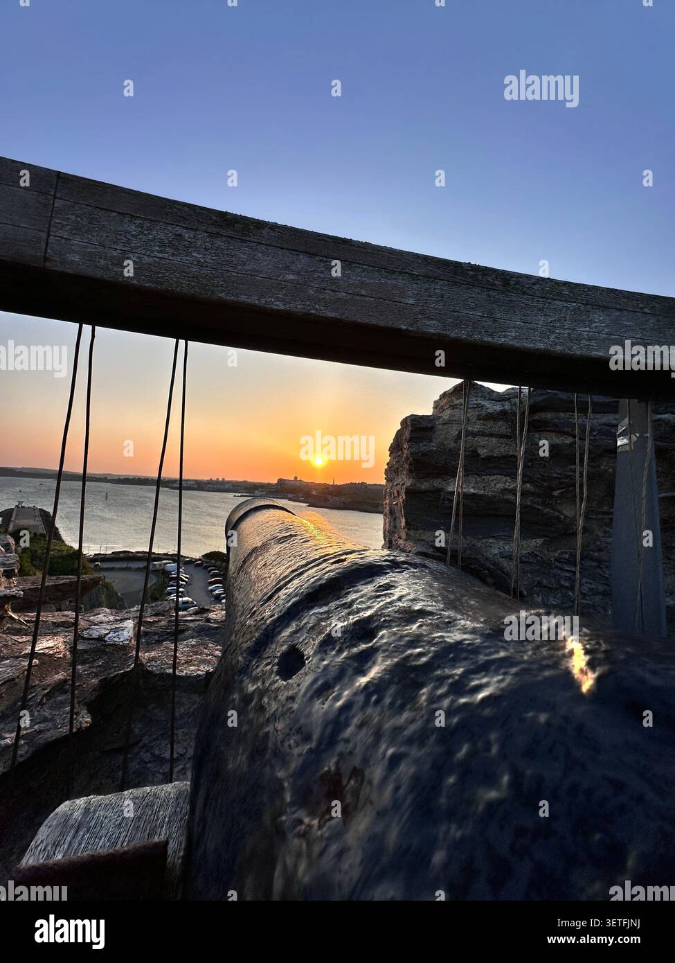 Sunset on the Summer Solstice over Plymouth Sound, England, with a view over Plymouth Hoe. Taken from Mountbatten Castle. - Smartphone Captured Stock Image