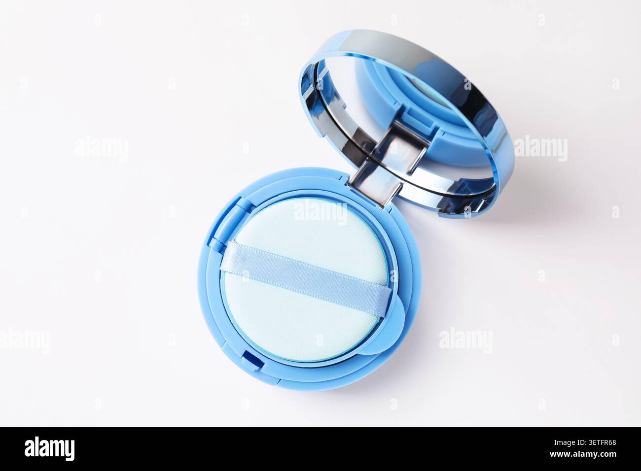 Cushion foundation on white background, top view. Makeup product Stock Photo