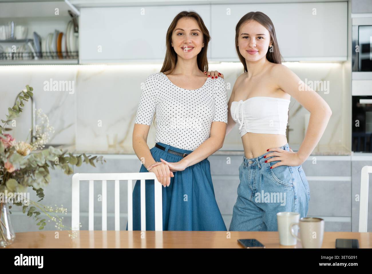 Two women posing together in hi-res stock photography and images - Alamy