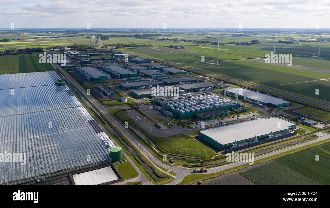 Aerial view of a massive hyperscale data center campus supporting cloud computing, big data, artificial intelligence and digital infrastructure. Stock Photo