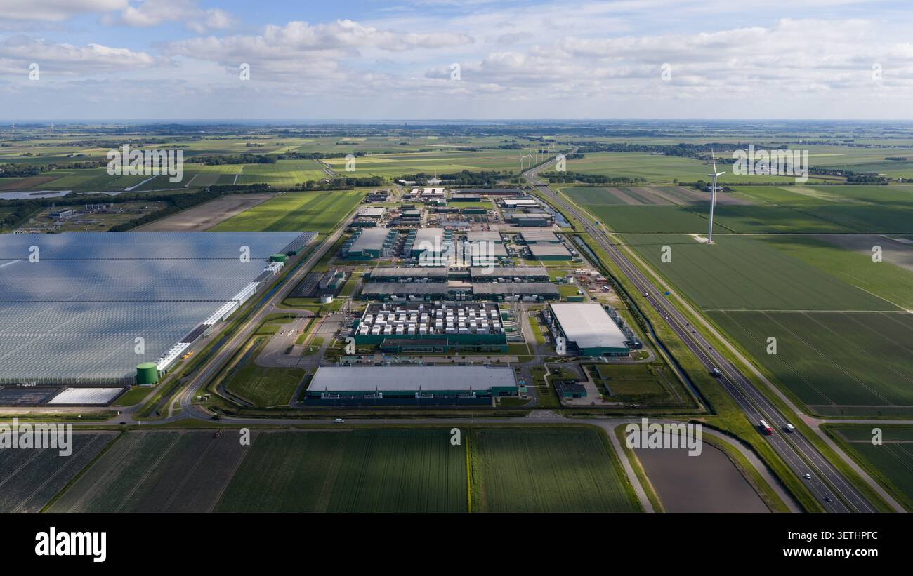 Aerial view of a massive hyperscale data center campus supporting cloud computing, big data, artificial intelligence and digital infrastructure. Stock Photo