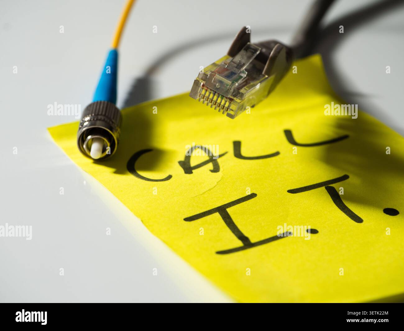 Reminder note to call network technician  Stock Photo