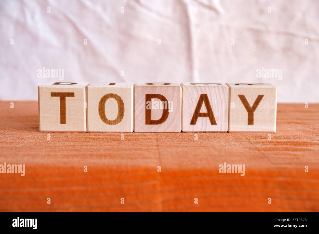 today, motivational word made of letters on wooden cubes Stock Photo