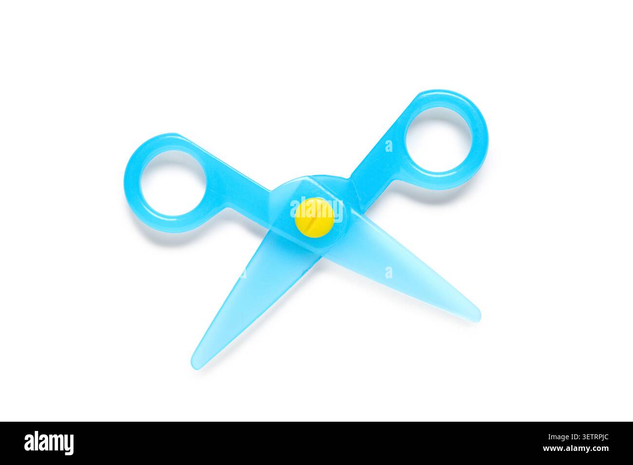 Blue plastic safety scissors on white background Stock Photo