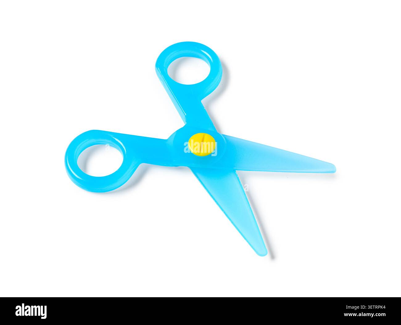 Blue plastic childrens scissors on white background Stock Photo