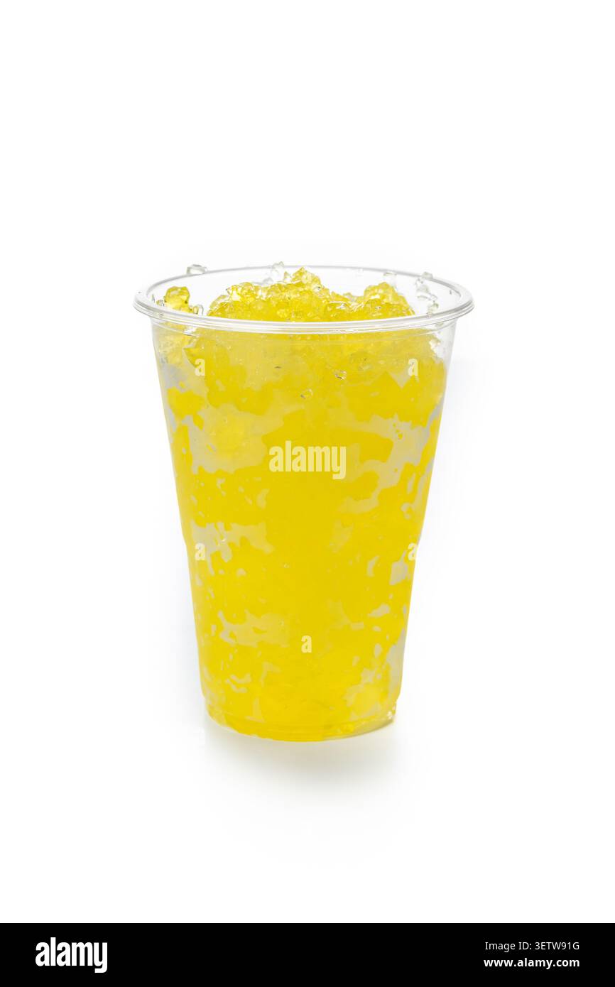 Yellow Frozen Slushie Drink in Plastic Cup Isolated on White Background Stock Photo