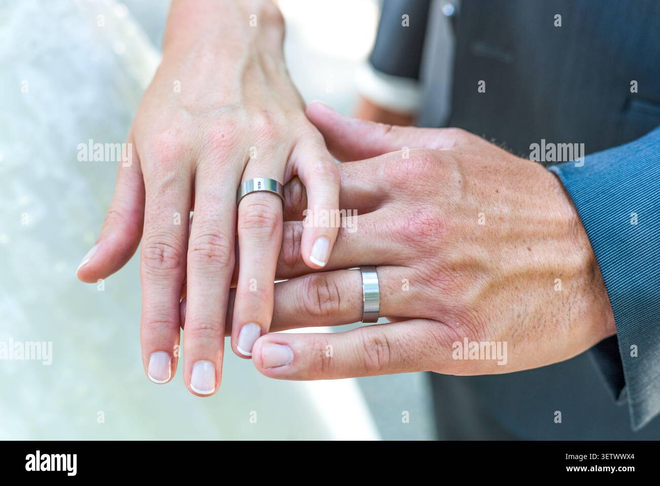 Hands of bride and groom, Wedding Rings Stock Photo