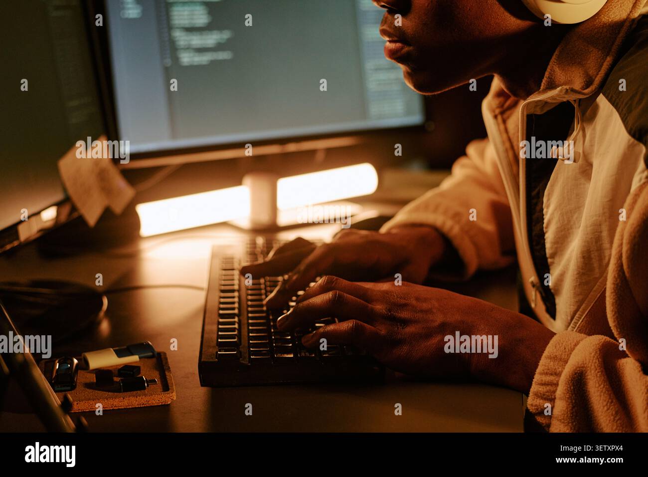 Black Man Coding at Computer for Software Development Project Stock Photo