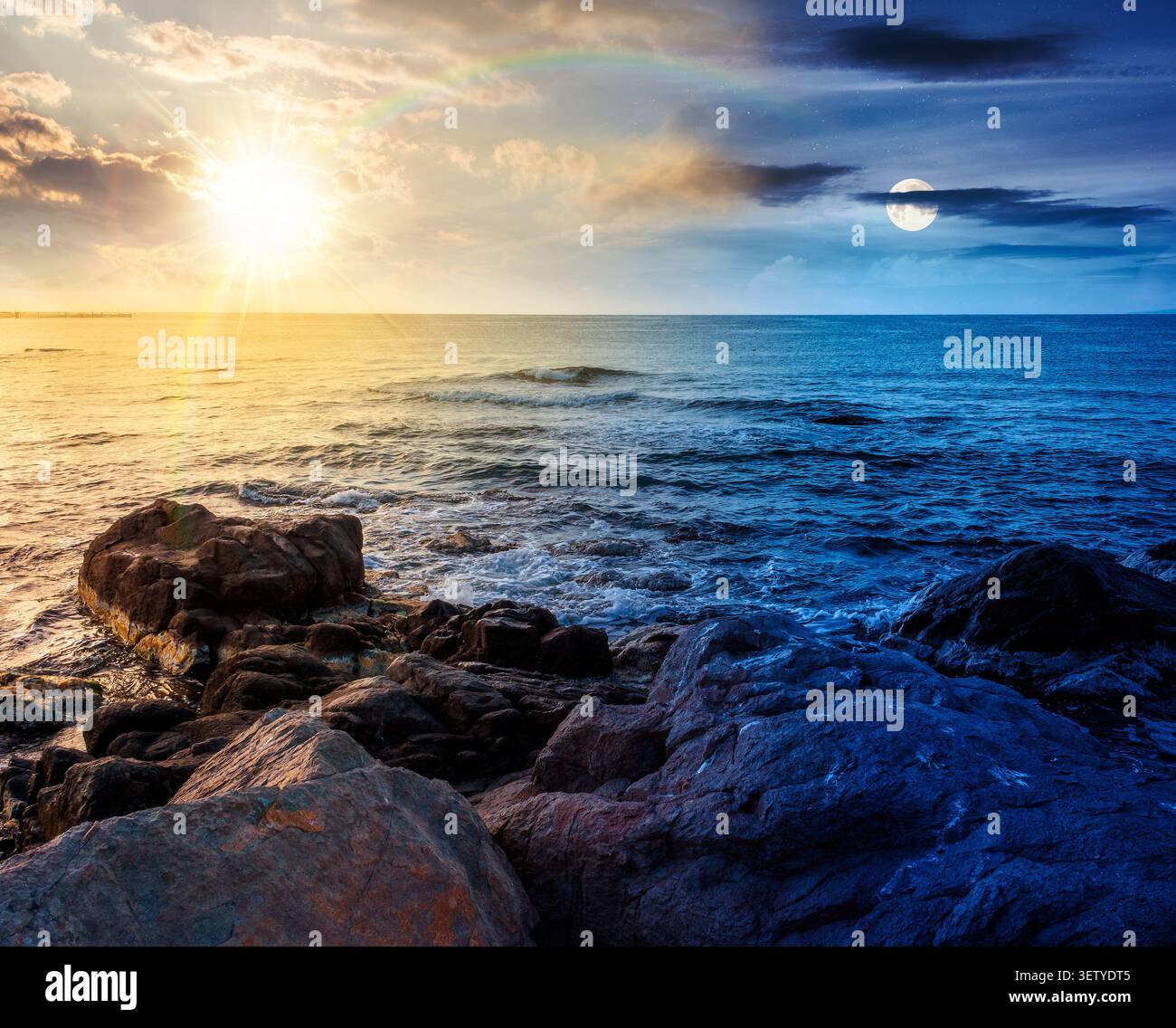 sea coast with stones and rocks. day meet night. summer vacation background at twilight. sun and moon in harmony over seascape with rough terrain. rel Stock Photo