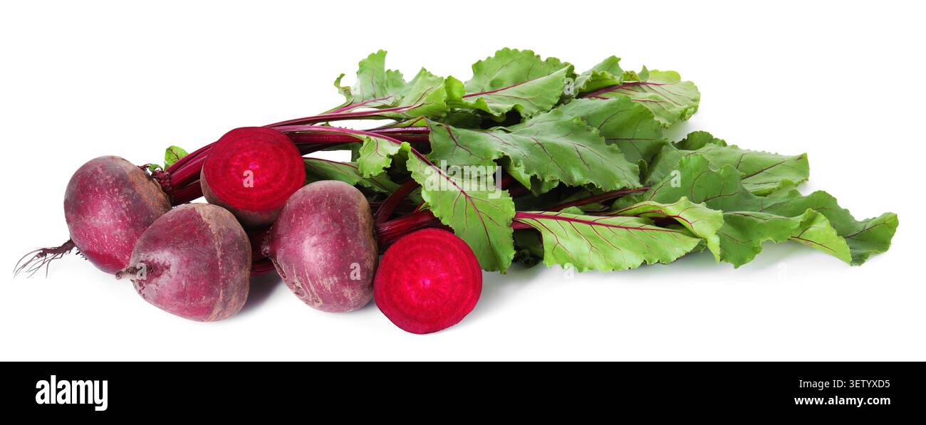 Whole and cut young beets with green leaves isolated on white Stock Photo