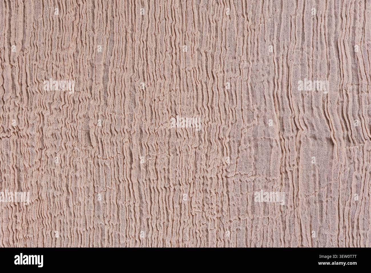 Vertical Crinkled Beige Fabric Texture Background Stock Photo
