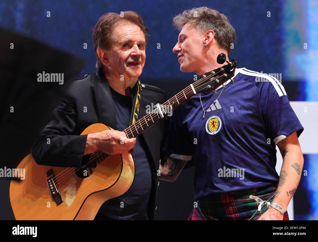 Donnie Munro (left) and Callum Beattie join Scotland fans before a ...