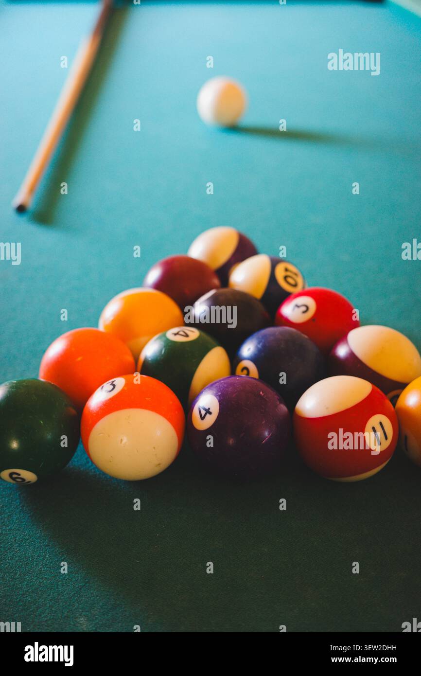 Pool Balls Arranged On Blue Billiard Table Stock Photo