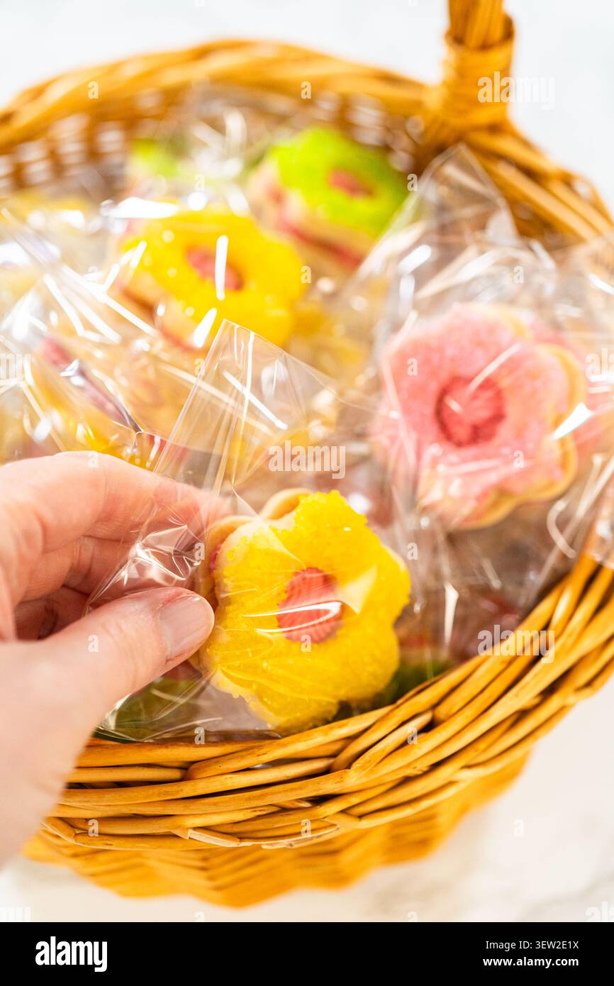Wrapped Easter Cookie Sandwiches in Basket Stock Photo