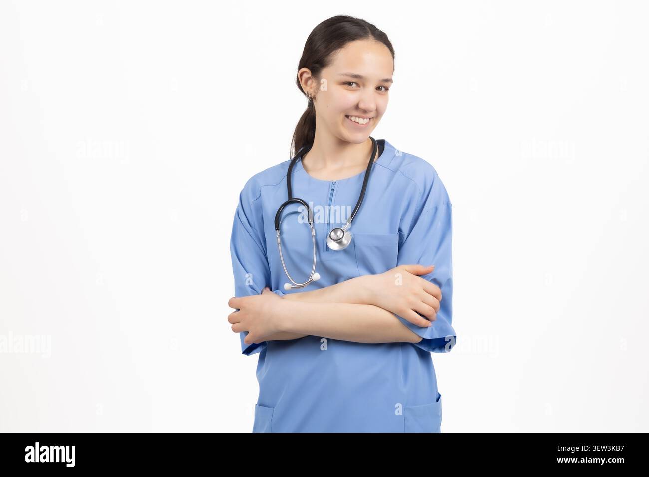 Professional female medical doctor posing inside studio environment Stock Photo