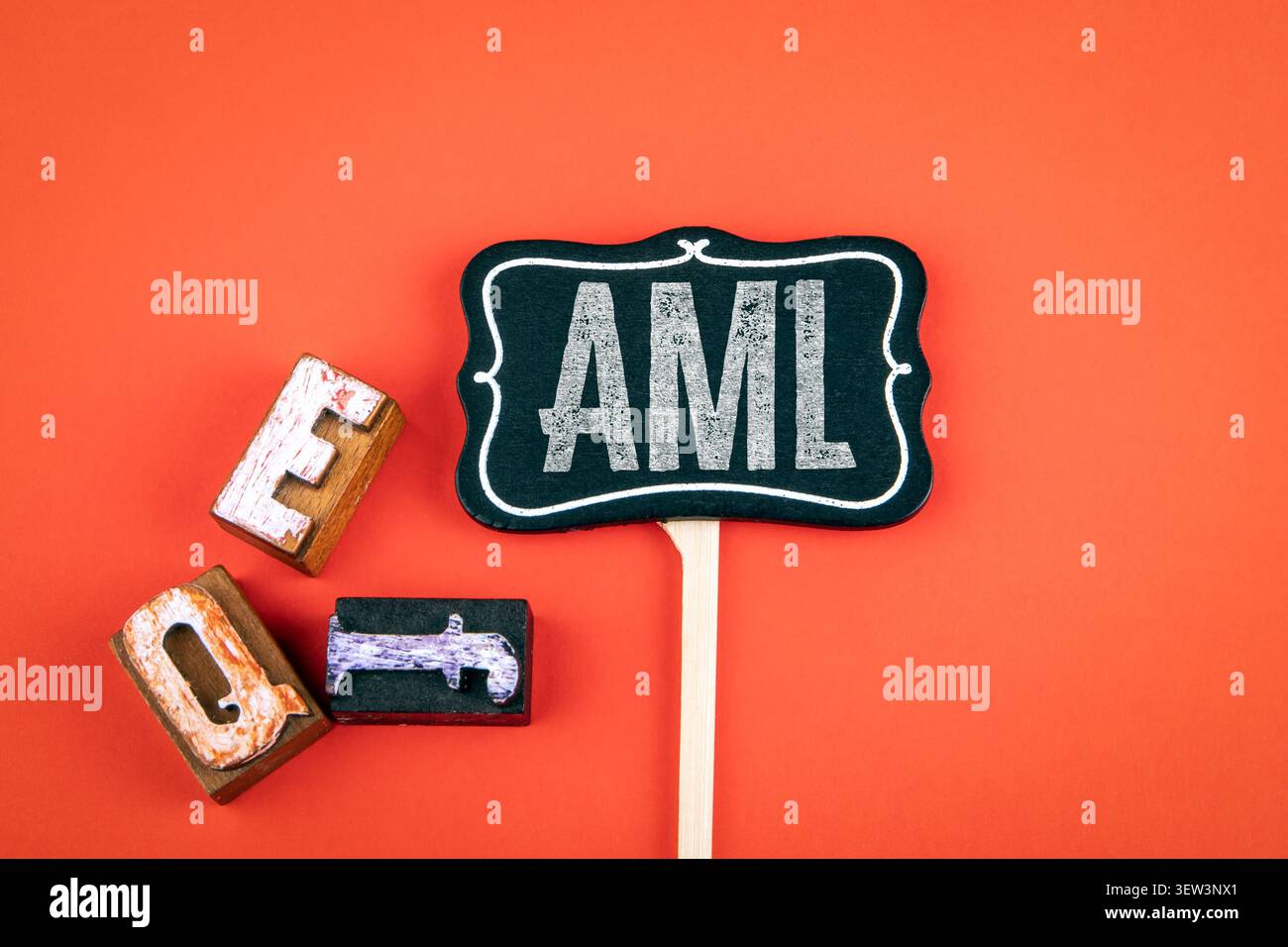 Anti money laundering concept shown by AML text on sign with letters on background Stock Photo